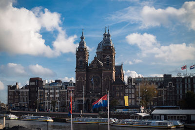 Buildings in city against sky