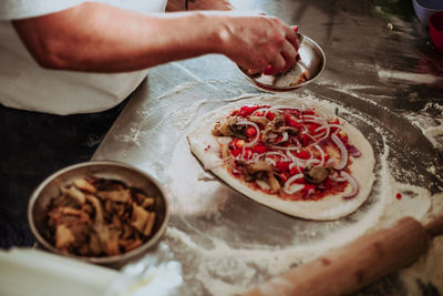 High angle view of person preparing food