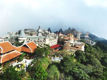 High angle view of buildings against sky