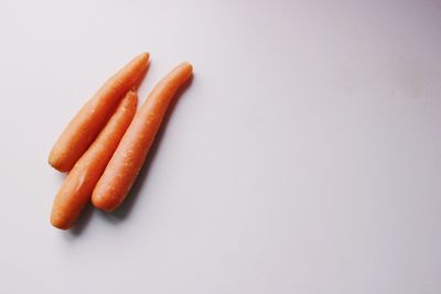 High angle view of bread on white background