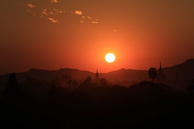 Scenic view of silhouette landscape against sky during sunset