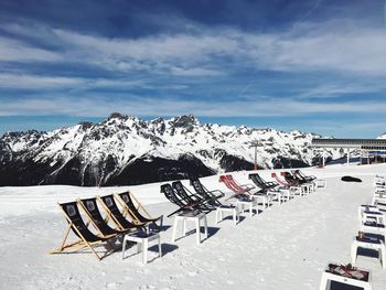 Scenic view of snow covered mountains against sky