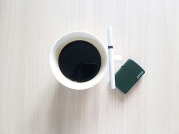 Close-up of coffee cup on table