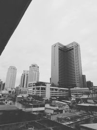 Modern buildings against sky in city