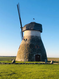 Low angle view of lighthouse against clear sky