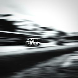 Blurred motion of car on road