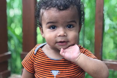 Portrait of cute baby boy at park