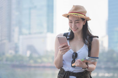 Young woman using mobile phone