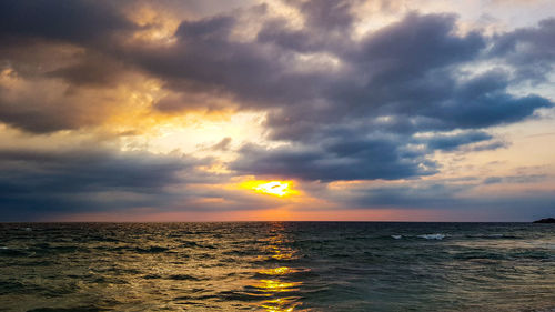 Scenic view of sea against sky during sunset