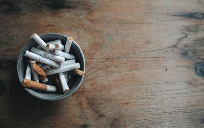 Close-up of cigarette on table