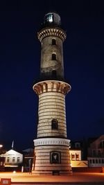 Low angle view of tower against clear blue sky