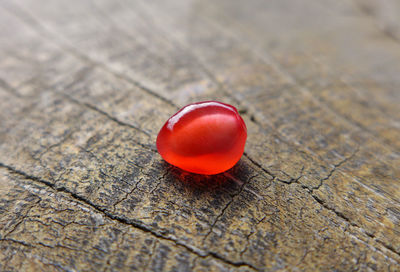 High angle view of red tomato on table