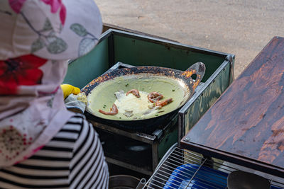 High angle view of woman preparing food