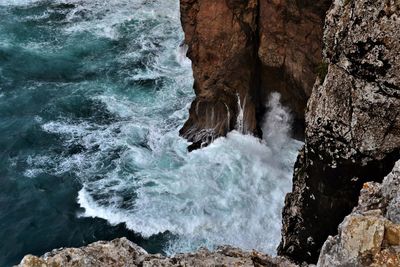 Scenic view of rocks in sea