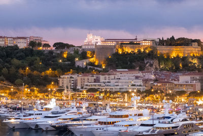 High angle view of illuminated buildings against sky