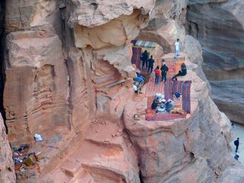 Group of people on rock formation