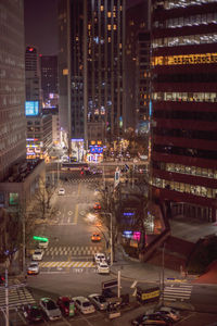 High angle view of traffic on city street at night