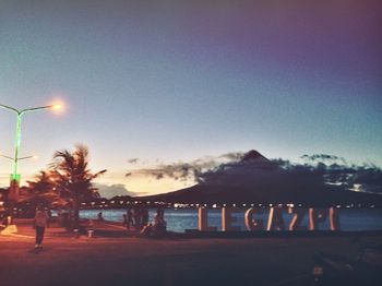 Scenic view of mountains against sky at night