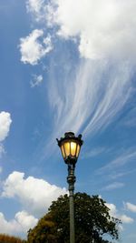 Low angle view of street light against sky