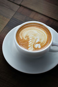 High angle view of cappuccino on table