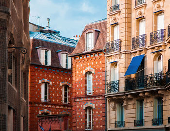 Low angle view of residential building against sky