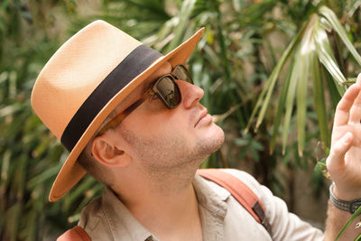 Close-up of woman wearing hat