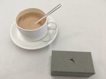 Close-up of coffee cup on table