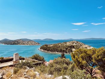 Scenic view of sea against blue sky