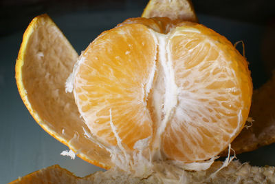 Close-up of orange slices on table