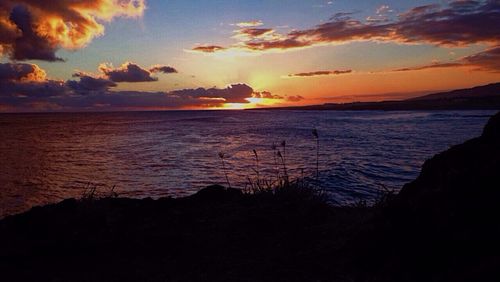 Scenic view of sea against sky during sunset