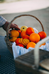 High angle view of fruits in basket on table