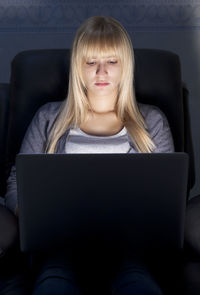 Young woman using mobile phone