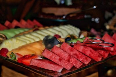 Close-up of fruits in plate on table