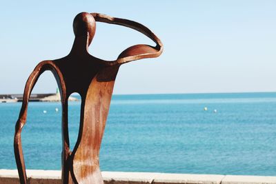 Close-up of sea against clear sky