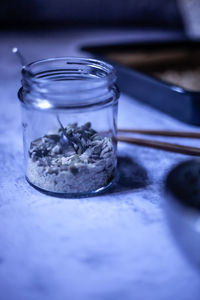 Close-up of water in glass jar on table