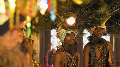 Men wearing costume during traditional festival