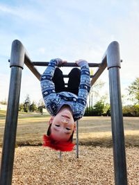 High angle view of cute baby boy sitting on playground