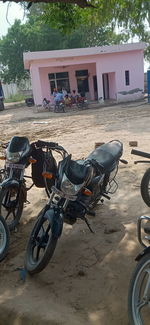 Bicycles parked on street by buildings