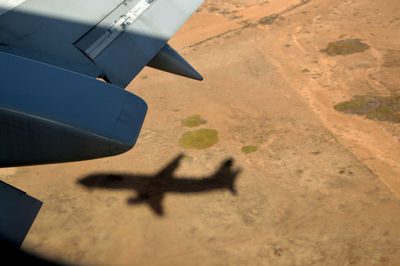 Airplane flying over land