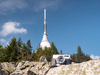 Vintage camera on stone and popular peak of jested preak. classic film camera photographers event