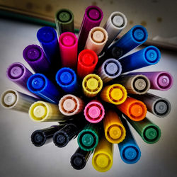 Close-up of colorful felt tip pens on table