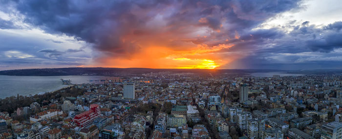 High angle view of city at sunset