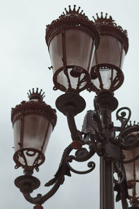 Low angle view of street light against clear sky