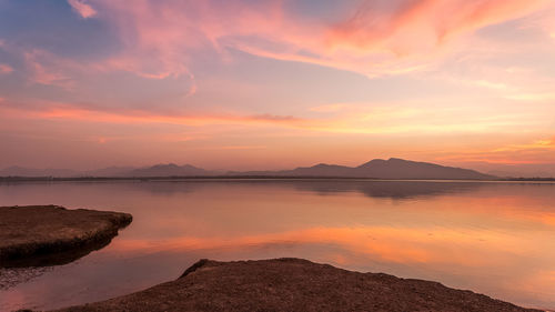 Scenic view of sea against sky during sunset