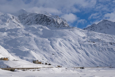 Scenic view of snowcapped mountains against sky