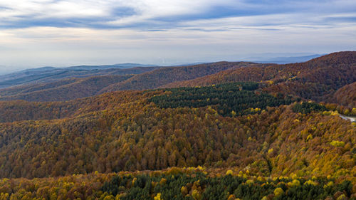 Scenic view of mountains against sky during autumn