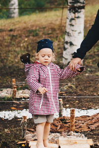 Full length of cute girl standing on land