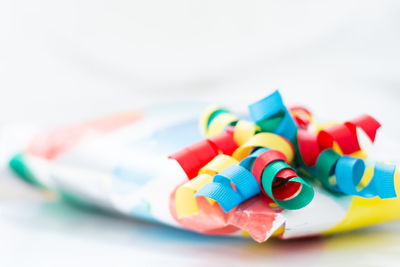 Close-up of multi colored candies on table