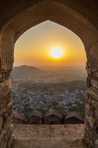 View of historical building against sky during sunset