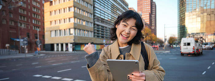 Young woman using mobile phone